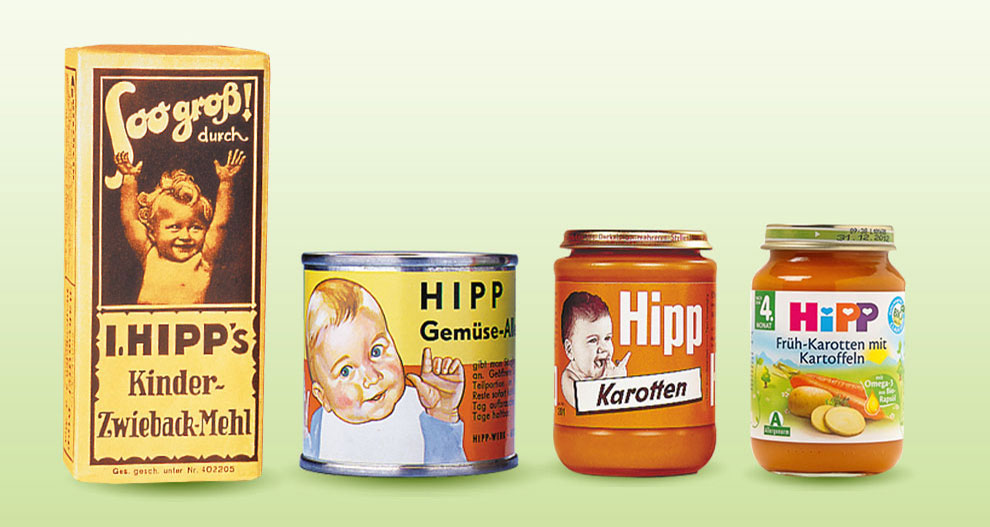 Keturios kūdikių maisto produktų talpyklos su skirtingo dizaino ir etiketėmis, rodančios pakuočių raidą laikui bėgant.